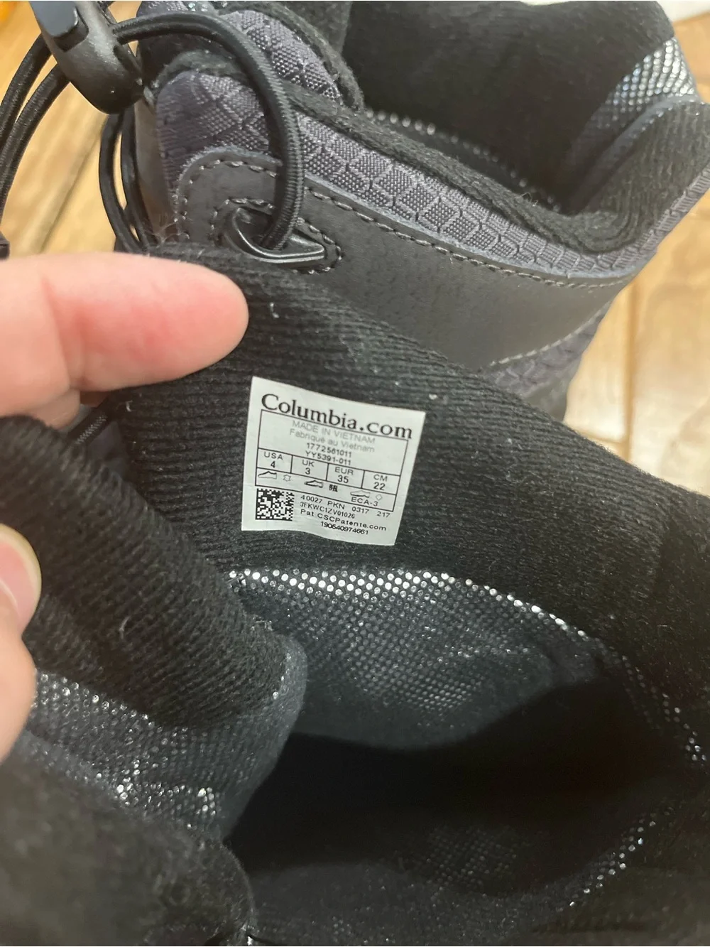 Columbia Black Kids Snow Boots with Blue Accents
